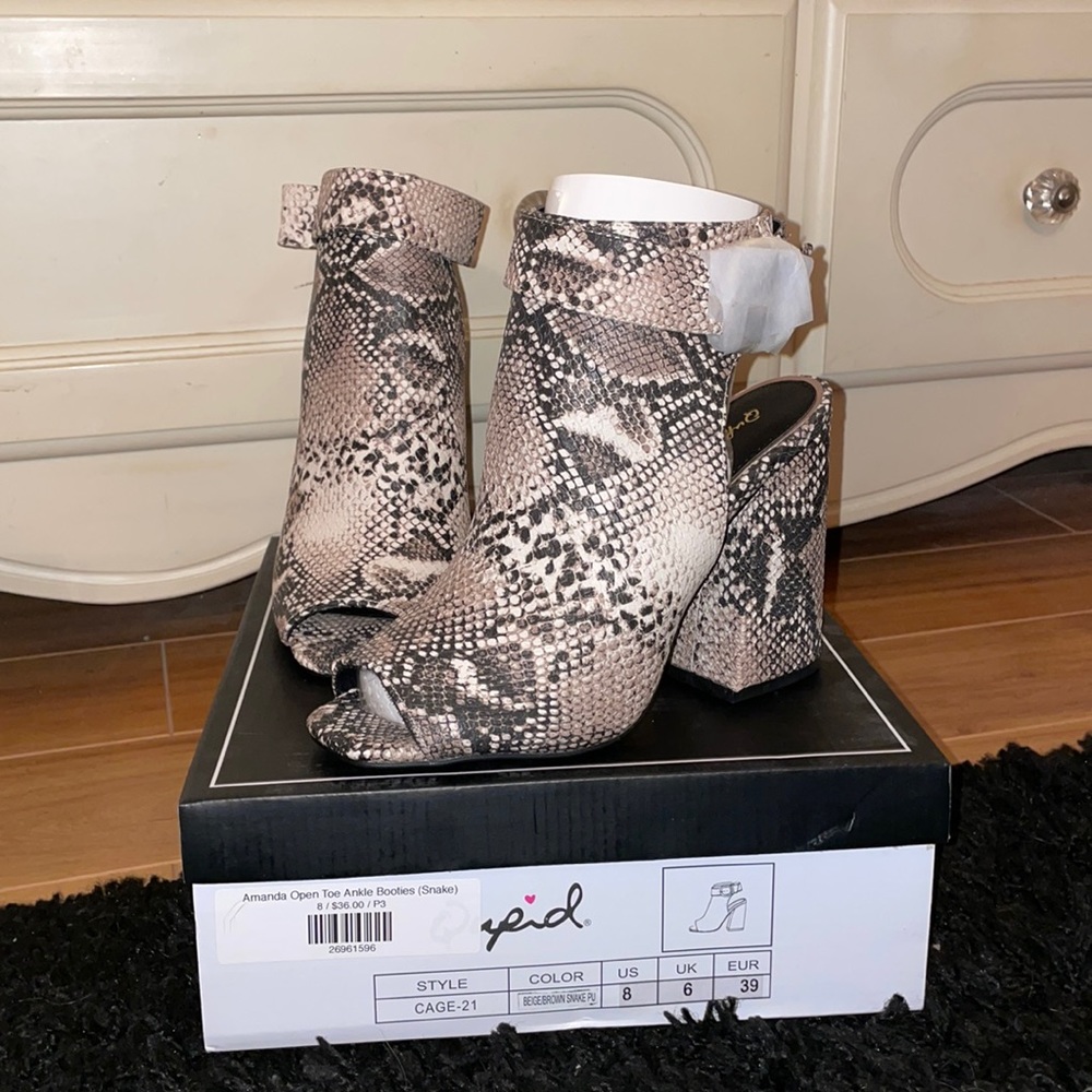 Never worn snake skin booties size 8